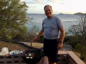 Photo of WICN host Pual Knaplund, grilling outdoors